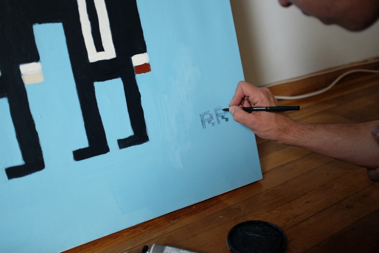 Signing a canvas